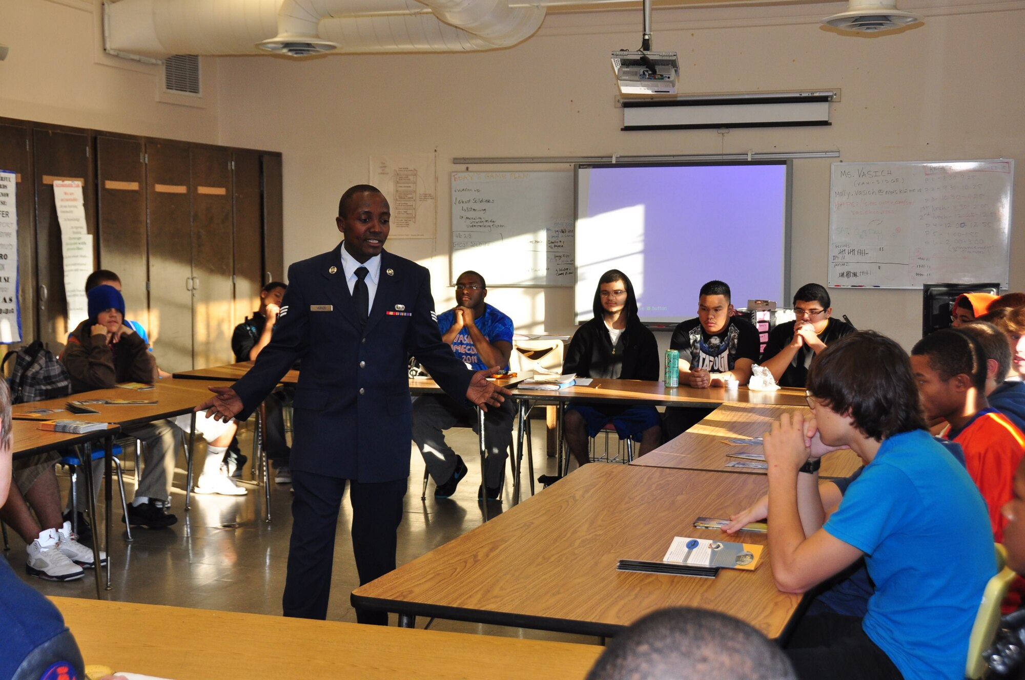Senior Airman Sammy Muriuki, 934th Communications Flight, talks about Air Force life with Washburn High School students Oct. 14.  The 934th Public Affairs Speaker's Bureau program provides speakers to organizations throughout the community talking about a variety of Air Force related topics.  To become a speaker or to request an Airman to speak at your organization contact the Public Affairs office at (613) 713-1217. (Air Force photo/Paul Zadach)