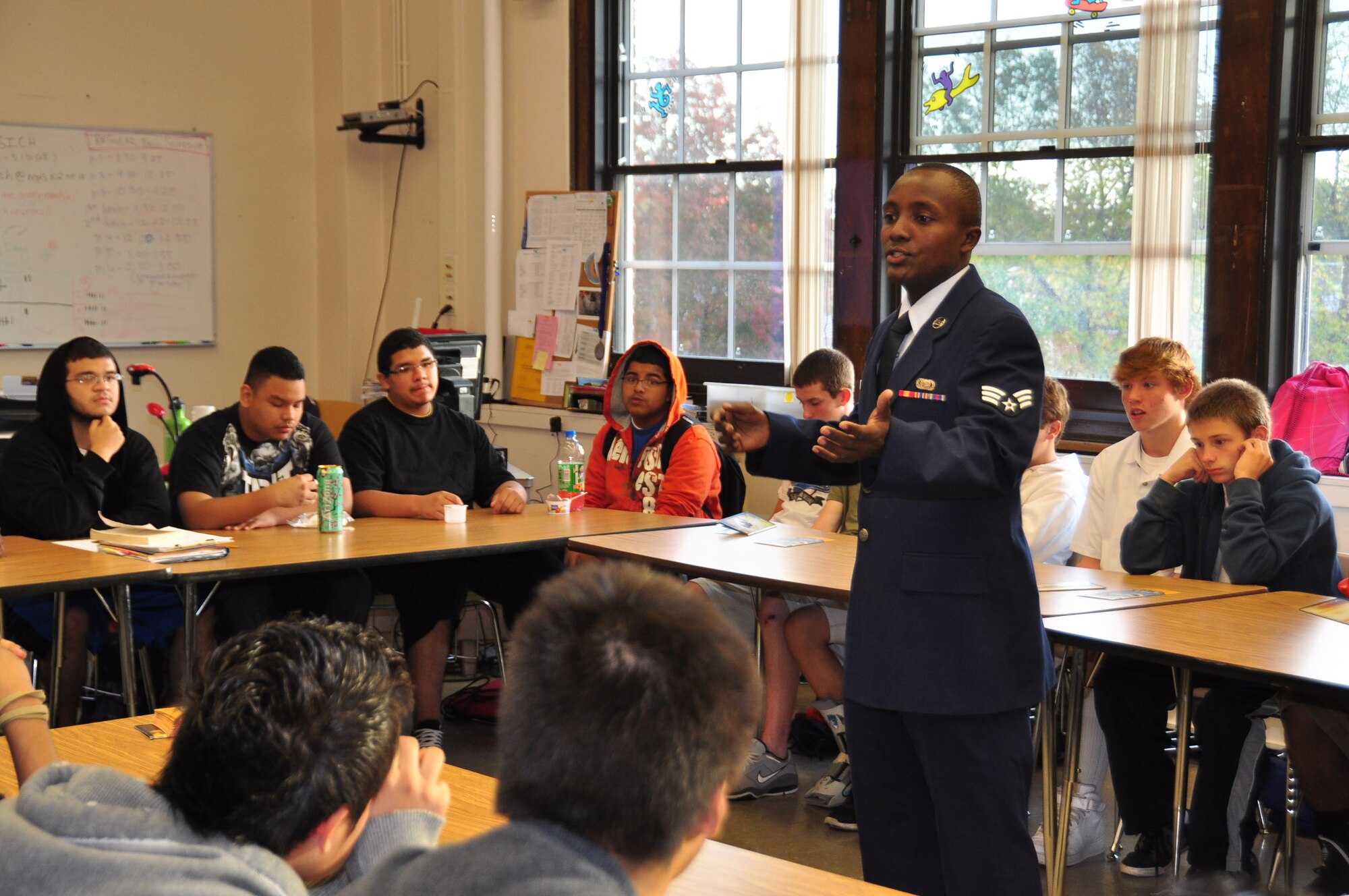 Senior Airman Sammy Muriuki, 934th Communications Flight, talks about Air Force life with Washburn High School students Oct. 14.  The 934th Public Affairs Speaker's Bureau program provides speakers to organizations throughout the community talking about a variety of Air Force related topics.  To become a speaker or to request an Airman to speak at your organization contact the Public Affairs office at (613) 713-1217. (Air Force photo/Paul Zadach)