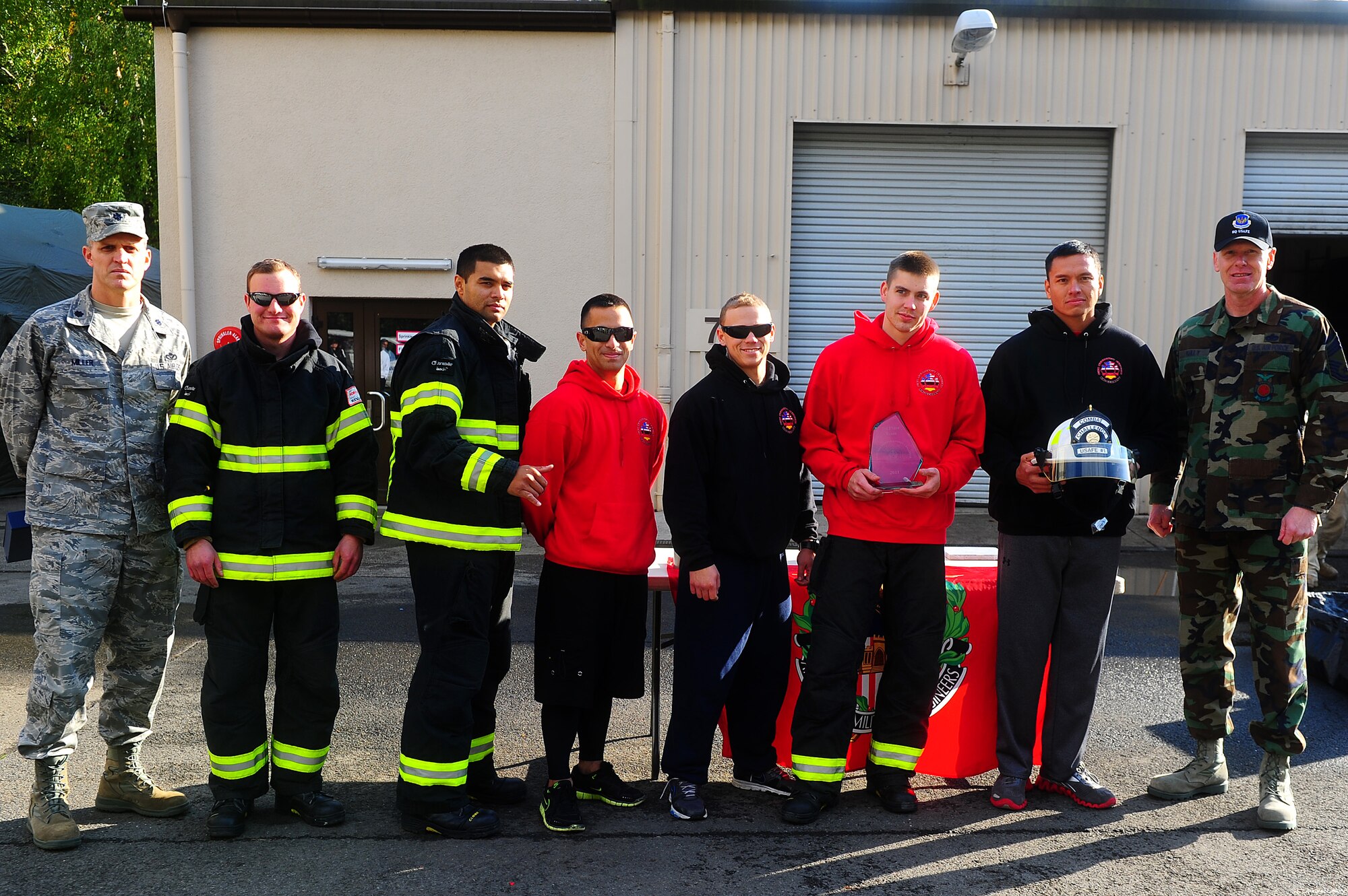 Air Force firefighters from the 886th Civil Engineer Squadron pose for a photo as the winners of the 435th Construction and Training Squadron Firefighter Combat Challenge, Ramstein Air Base, Germany, Oct. 20, 2011. The event promoted physical fitness and enhanced camaraderie between firefighters within U.S. Air Forces in Europe. Winners will continue on to the final challenge held in Myrtle Beach, S.C., Nov. 14-19, 2011. (U.S. Air Force photo by Airman 1st Class Brea Miller)