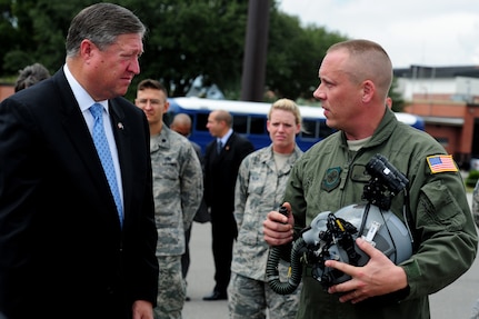 Staff Sgt. Michael Leimbach briefs Secretary of the Air Force Michael Donley on night vision capabilities used during Forward Aerial Refueling operations as part of his visit to Joint Base Charleston, Oct. 18, 2011. The Secretary of the Air Force is responsible for the affairs of the Department of the Air Force, including the organizing, training, equipping and providing for the welfare of its more than 334,000 men and women on active duty, 176,000 members of the Air National Guard and the Air Force Reserve, 170,000 civilians, and their families. He also oversees the Air Force's annual budget of more than $119 billion. Leimbach is with the 628th Logistics Readiness Squadron.  (U.S. Air Force photo/ Staff Sgt. Nicole Mickle)