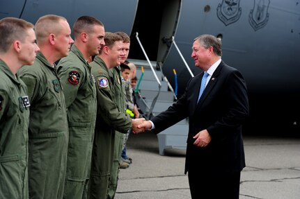 Secretary of the Air Force, Michael Donley coins members of the 628th Logistics Readiness Squadron during his visit to Joint Base Charleston, Oct. 18, 2011.  The Secretary of the Air Force is responsible for the affairs of the Department of the Air Force, including the organizing, training, equipping and providing for the welfare of its more than 334,000 men and women on active duty, 176,000 members of the Air National Guard and the Air Force Reserve, 170,000 civilians, and their families. He also oversees the Air Force's annual budget of more than $119 billion.  (U.S. Air Force photo/ Staff Sgt. Nicole Mickle) 