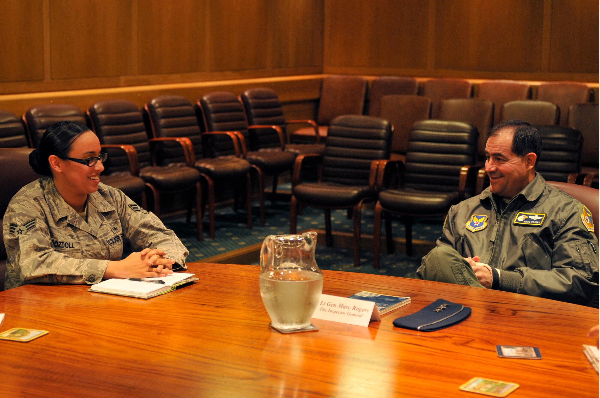 ROYAL AIR FORCE LAKENHEATH, England - Lt. Gen. Marc E. Rogers, Inspector General of the Air Force, speaks with Senior Airman Alexandria Pozdoll, 48th Medical Support Squadron medical logistician, during the general?s visit to the 48th Fighter Wing, Oct. 17, 2011. Rogers hosted symposiums of commanders, first sergeants and junior enlisted members to get feedback on Air Force policies. (U.S. Air Force photo by Staff Sgt. David Dobrydney)