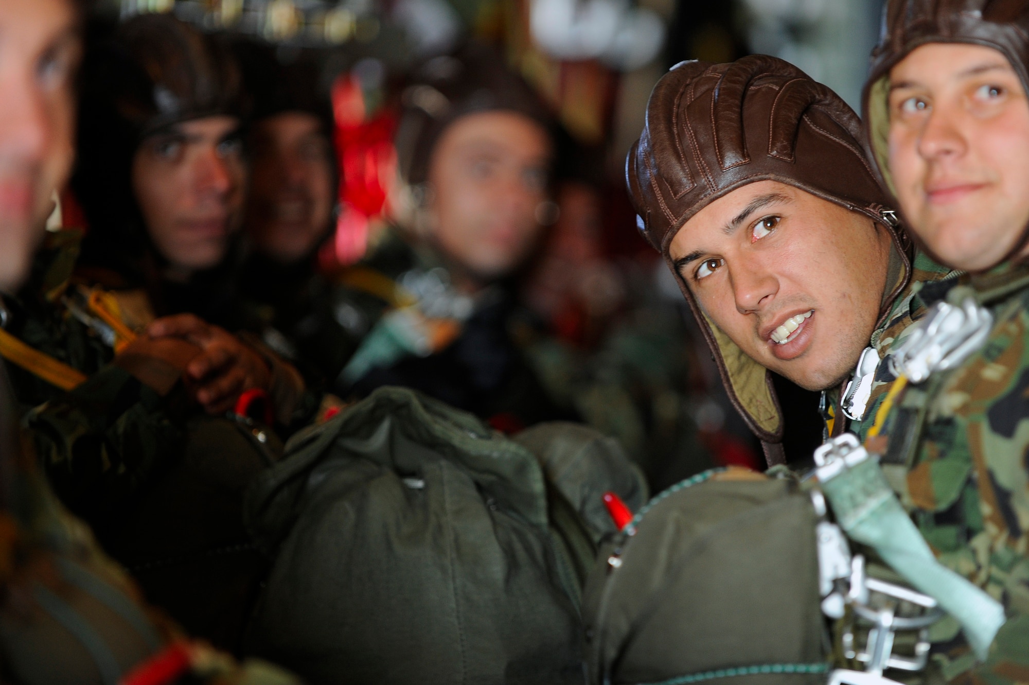 A Bulgarian parartrooper receives instructions just prior to static-line parachuting from a C-130J Super Hercules, during Operation Thracian Fall 2011, Oct. 19, 2011, in Plovdiv, Bulgaria. OTF11 is off-station training designed to enhance interoperability between U.S. and Bulgarian Air Forces as well as build partnerships with paratroopers from both. (U.S. Air Force photo by Senior Airman Stephen J. Otero)