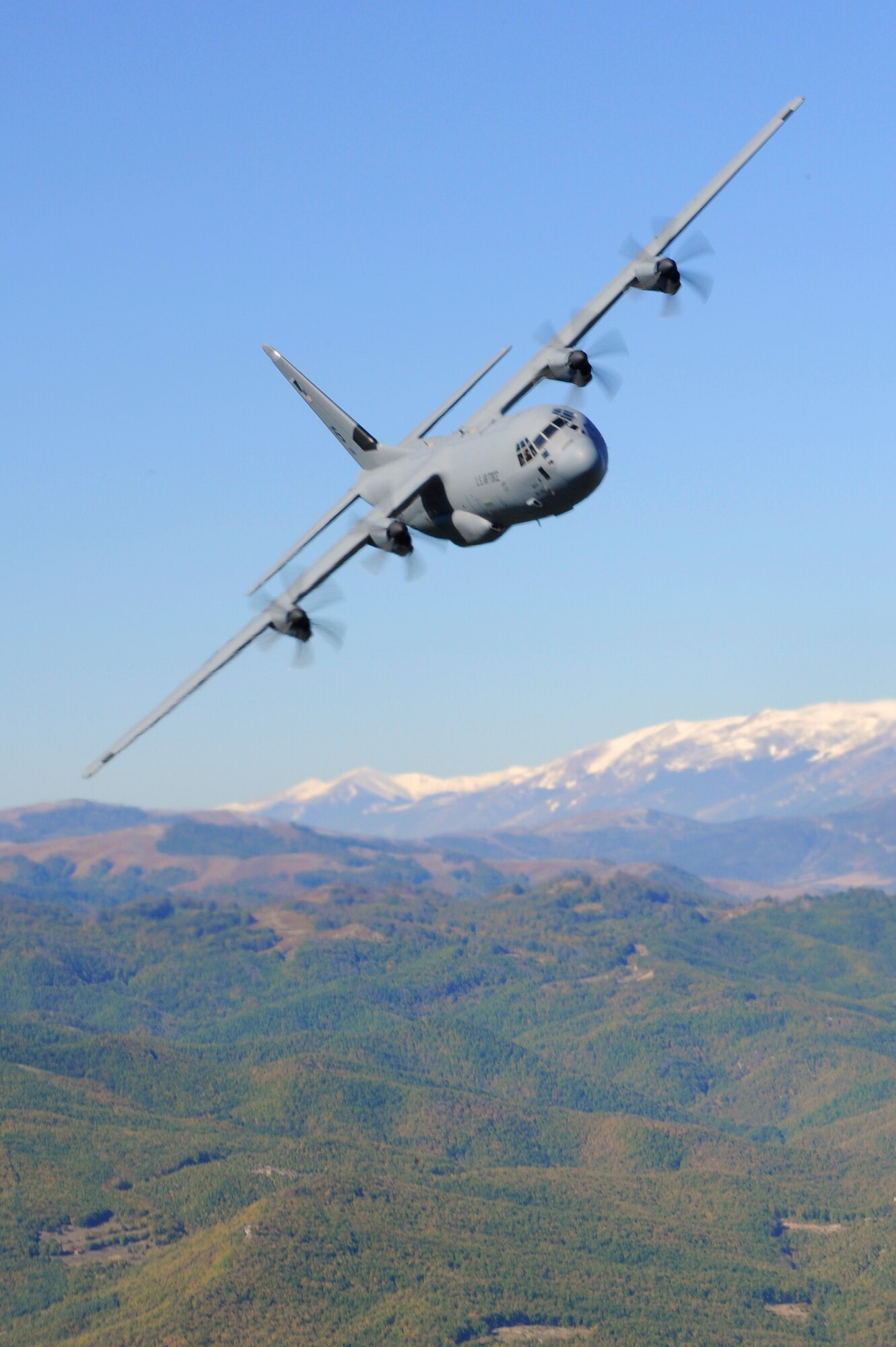 A C-130J Super Hercules assigned to the 37th Airlift Squadron, Ramstein Air Base, Germany, conducts low-level flight training during Operation Thracian Fall 2011, Oct. 19, 2011 in Plovdiv, Bulgaria. OTF11 is off-station training designed to enhance interoperability between U.S. and Bulgarian Air Forces as well as build partnerships with paratroopers from both. (U.S. Air Force photo by Senior Airman Stephen J. Otero)