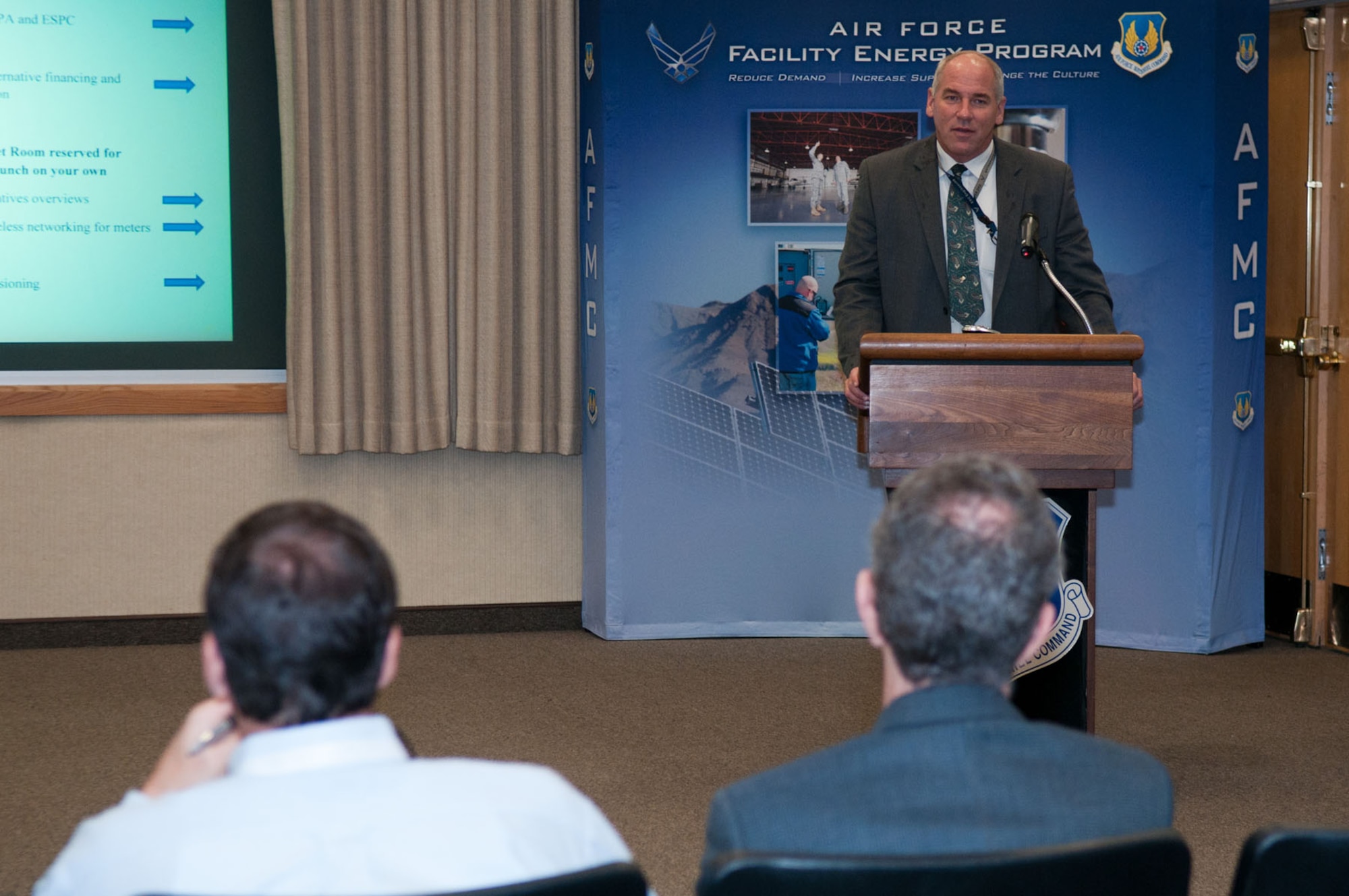 HANSCOM AIR FORCE BASE, Mass. – Tom Schluckebier, base civil engineer, speaks to industry representatives during Energy Awareness Month Industry Days Oct. 13 at the Hanscom Conference Center. Civil Engineering teamed up with Operational Contracting to invite industry organizations to talk about renewable energy, energy conservation and energy security to help Hanscom move forward with energy-saving projects. (U.S. Air Force photo by Rick Berry)