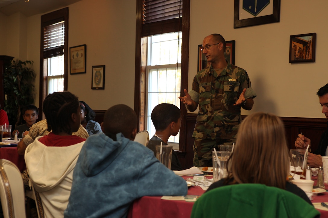 Navy Capt. Craig Fulton, director of the Installations and Environment office for Marine Corps Installations – East, encourages young leaders in the community to continue to practice energy saving habits during the Youth Leadership Luncheon at the Paradise Point Officers’ Club, aboard Marine Corps Base Camp Lejeune, Oct. 21.