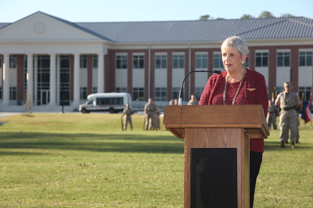 Alice C. Magee, daughter of Gen. Christian F. Schilt, delivers the keynote address during the ceremony that officially dedicated the headquarters building to her father. Magee said that it was an honor for Schilt and the entire family.