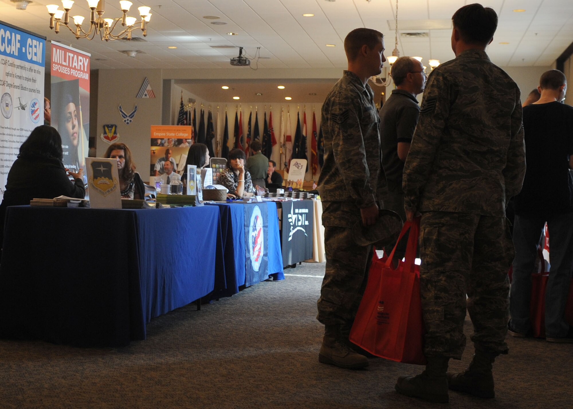 Dyess members learn what different universities have to offer during an education fair Oct. 18, 2011 at Dyess Air Force Base, Texas. The education center located on base sponsors multiple colleges that offer different career paths to follow. (U.S. Air Force photo by Airman 1st Class Jonathan Stefanko/ Released)