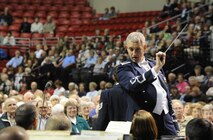 Col. A. Philip Waite, U.S. Air Force Band commander and conductor, leads the concert band Oct. 20 at the Heartland Events Center, Grand Island, Neb. The USAF Band is on their 25-day community relations tour across Montana, Wyoming, Nebraska and South Dakota. (U.S. Air Force photo by Airman 1st Class Tabitha N. Haynes) 

