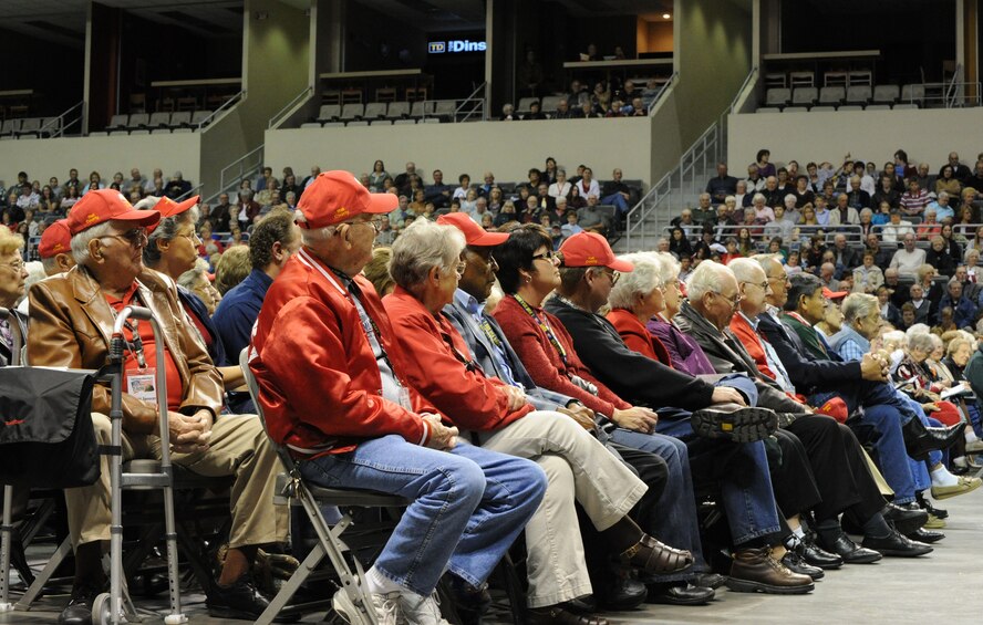 The Nebraska World War II Honor Flight sits front row at the U.S. Air Force Band's performance Oct. 20 at the Heartland Events Center, Grand Island, Neb. Col. A. Philip Waite, USAF Band commander and conductor, honored the unit during the show, bringing the entire venue to their feet in appreciation of the veterans' service. (U.S. Air Force photo by Airman 1st Class Tabitha N. Haynes)

