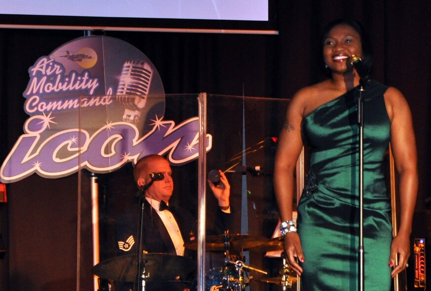 Tech. Sgt. Chastity Sullivan sings "I Believe in You and Me" during the Air Mobility Command Icon finals competition Oct. 20, 2011, at Scott Air Force Base, Ill. Sullivan, from the Joint Communications Support Element at MacDill Air Force Base, Fla., was participating in her first Icon competition. The Valdosta, Ga., native made it to the finals by winning the base level competition at MacDill AFB. Icon is an AMC commander's initiative to showcase the vocal talents of AMC Airmen. Each AMC base holds Icon contests in July and August to determine their representatives for the command final which takes place at Scott AFB. (U.S. Air Force Photo/Master Sgt. Sabrina D. Foster)