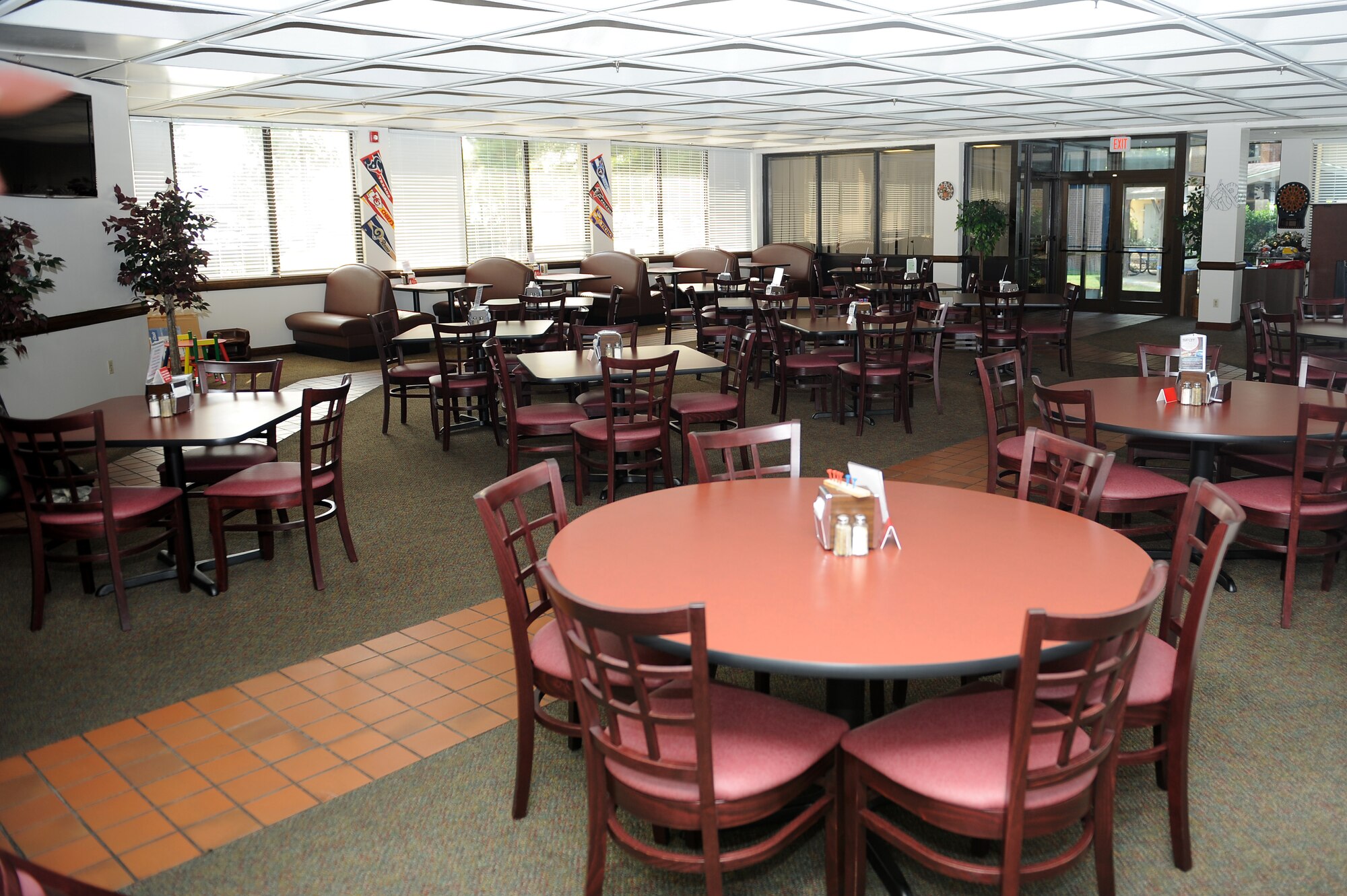 One of the Georgia Pines Dining Facility dining rooms is  newly furnished with a few new renovations on Moody Air Force Base, Ga., Oct. 19, 2011. The dining facility staff has replaced the old carpet, added new seating and games for Airmen to enjoy. They are also in the process of replacing the old kitchen equipment and upgrading the menu to improve the food selection for customers. (U.S. Air Force photo by Senior Airman Ciara Wymbs/Released)
