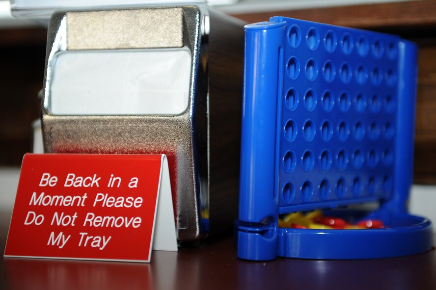 The Georgia Pines Dining Facility recently set up small board games on tables at Moody Air Force Base, Ga., Oct. 19, 2011. The dining facility introduced new games and an assortment of events to increase morale and improve the quality of life for Airmen who dine there.  (U.S. Air Force photo by Senior Airman Ciara Wymbs/Released)