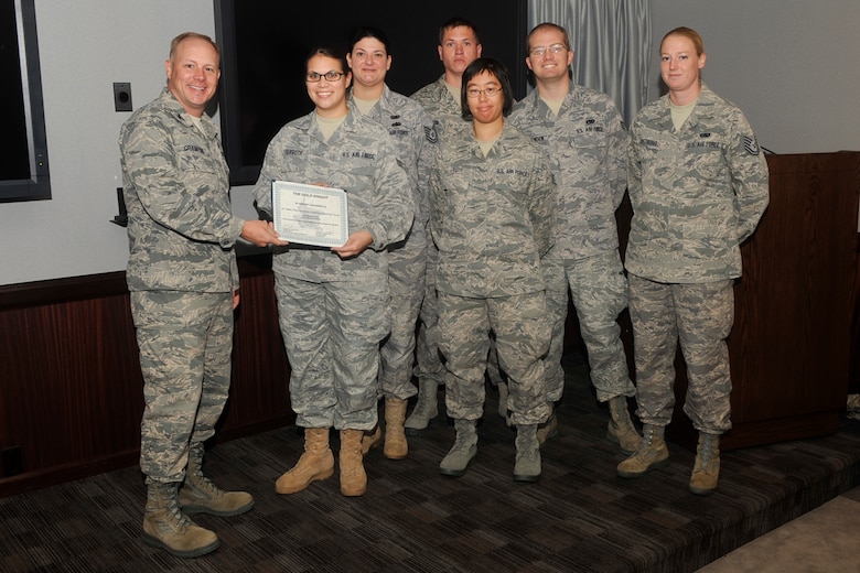The 21st Space Wing Deployment Control Center team was named the Gold Knight recipient for September. (U.S. Air Force photo/Robb Lingley)