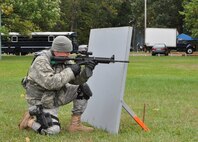 WRIGHT-PATTERSON AIR FORCE BASE, Ohio - Master Sgt. Walter Bennett, 445th Security Forces Squadron, takes cover during a weapons maneuver exercise Oct. 1, 2011 at Wright-Patterson Air Force Base, Ohio. (U.S. Air Force Photo/Tech. Sgt. Jeremy Caskey)


