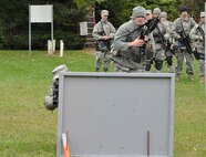 WRIGHT-PATTERSON AIR FORCE BASE, Ohio - Members of the 445th Security Forces Squadron conduct weapons maneuver exercises during a squadron exercise Oct. 1, 2011 at Wright-Patterson Air Force Base, Ohio. (U.S. Air Force Photo/Tech. Sgt. Jeremy Caskey)