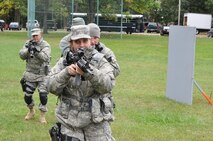 WRIGHT-PATTERSON AIR FORCE BASE, Ohio - Tech Sgt Kathleen Wyatt, Emergency Management Technician, practices maneuvers with members of 445th Security Forces Squadron Oct. 1, 2011 at Wright-Patterson Air Force Base, Ohio. (U.S. Air Force Photo/Tech. Sgt. Jeremy Caskey)