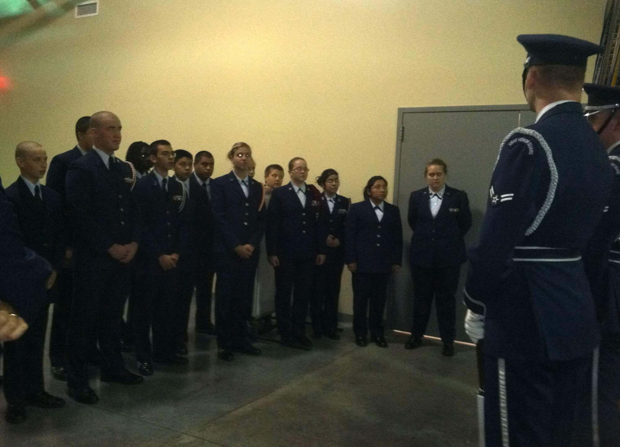 The U.S. Air Force Honor Guard Colors Team speaks to the Grand Island Senior High School, Grand Island, Neb., junior reserve officer training corps class Oct. 20 at the Heartland Events Center, Grand Island, Neb., after the colors team presented the flag at the U.S. Air Force Band concert. The colors team assists the USAF Band on their annual Fall Tour in spreading the message of the Air Force global mission across the country on the community relations tours. (U.S. Air Force photo by Airman 1st Class Tabitha N. Haynes)