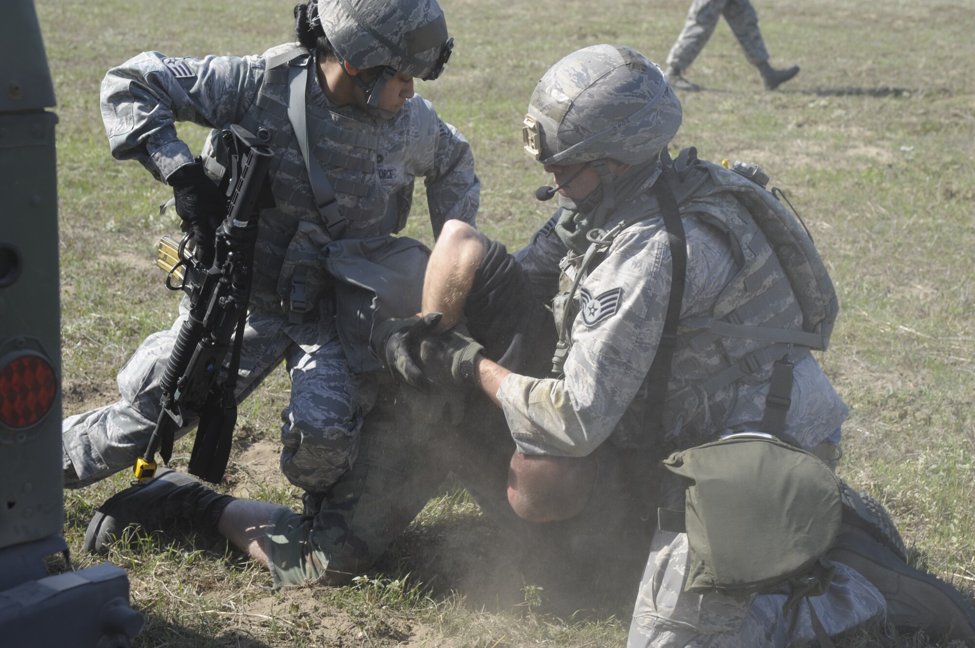 VANDENBERG AIR FORCE BASE, Calif. -- Team members from the 30th Security Forces Squadron take a surrendering enemy into custody during an exercise at the North Star training area here Thursday, Oct. 20, 2011. 
(U.S. Air Force photo/Jerry E. Clemens, Jr.)