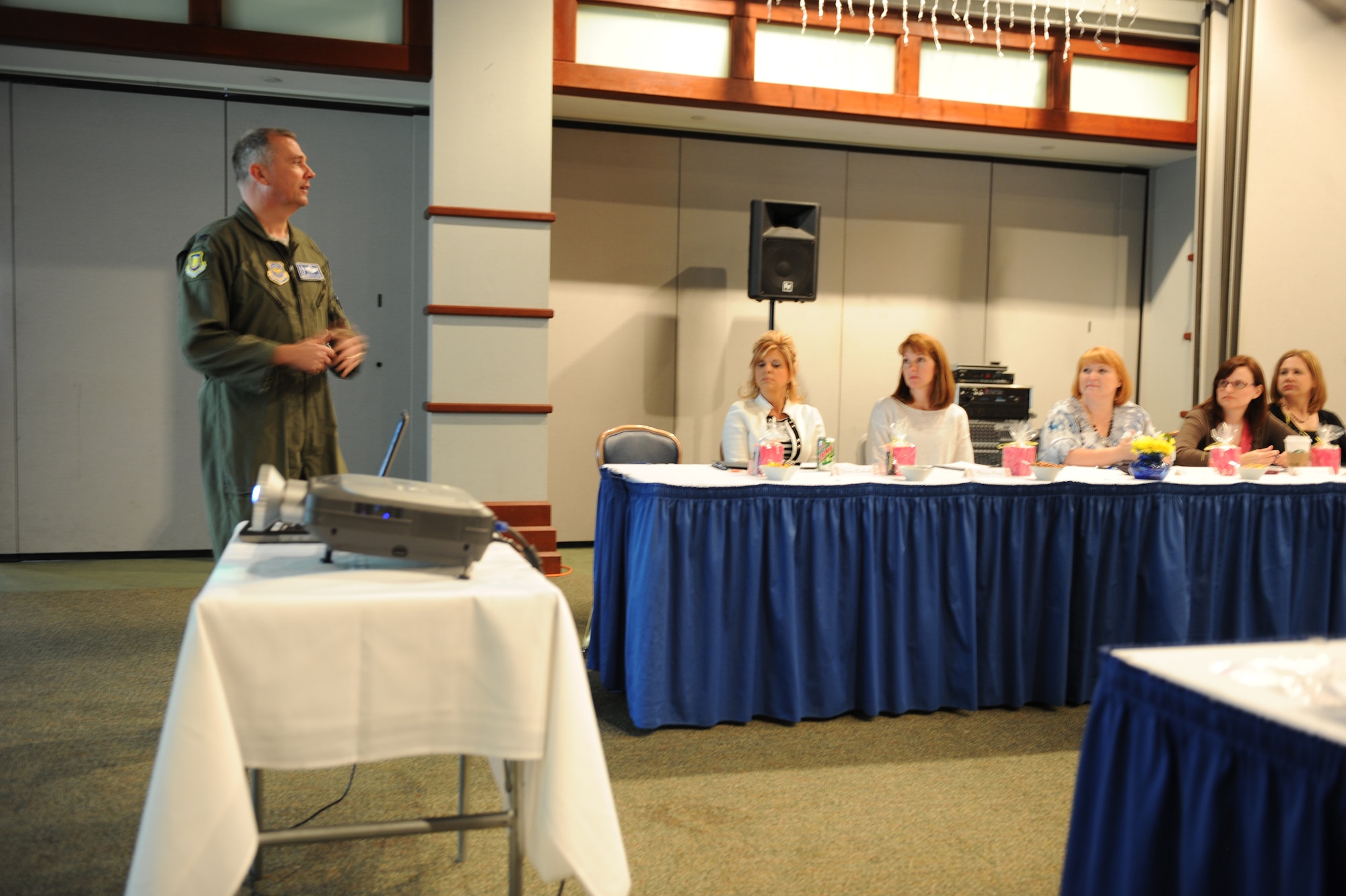 Col. Ricky Rupp, 22nd Air Refueling Wing commander, address spouses at the Spouse’s Leadership Forum held at the Robert J. Dole Community Center Oct. 4, 2011.  Charlotte Rupp, Colonel Rupp’s wife, organized the event as a networking and mentorship opportunity and to help the spouses understand the resources available on base and within the community.  (U.S. Air Force Photo/ Airman 1st Class Maurice Hodges)