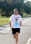 Michael Lyle, 341st Training Squadron material supply instructor, wins the 10-kilometer Gateway Classic Run Oct. 15. (U.S. Air Force photo/Alan Boedeker)