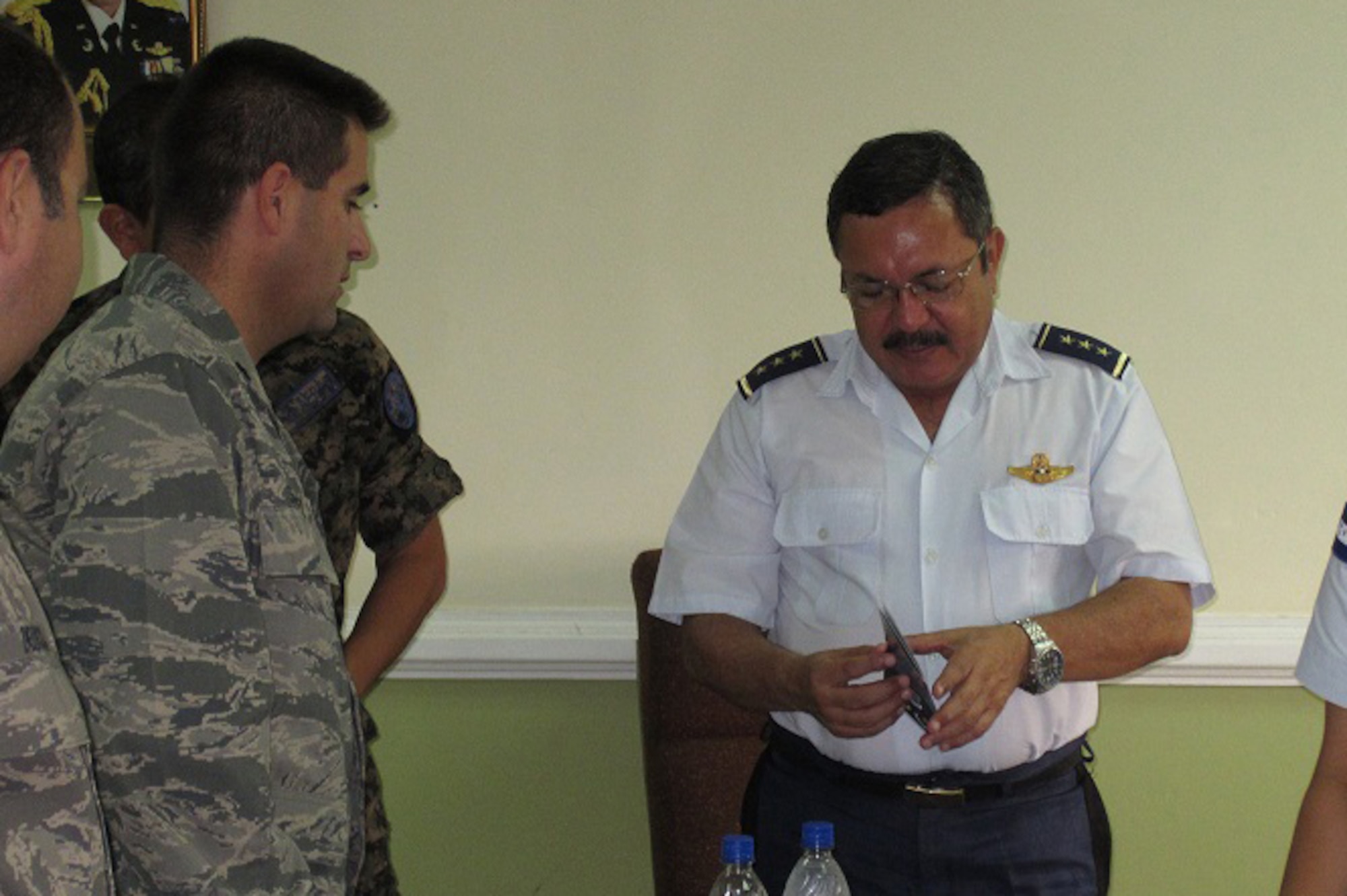 Lt. Col. Sanchez, commander of the 571st Mobility Support Advisory Squadron, discusses the squadron’s mission with Colonel Roberto Flores, Honduran Air Force Vice-Commander during the unit’s recent trip to Honduras. The 571st MSAS, part of the 615th Contingency Response Wing based here is manned and equipped to work side-by-side with a partner nation’s military personnel to help develop their air mobility system. (Courtesy Photo)