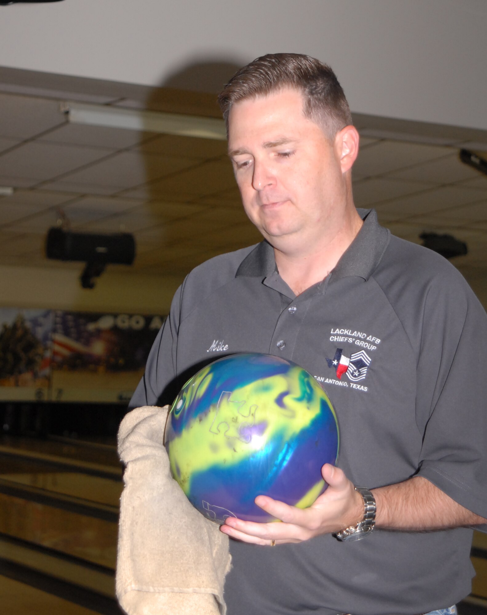GOODFELLOW AIR FORCE BASE, Texas -- Chief Master Sgt. Mike Dollar, 315th Training Squadron A team, gets ready for a warm up at the Thede Bowling Center. Dollar bowled a 290 during a league game, helping his team remain undefeated. (U.S. Air Force photo/Connie Hempel)