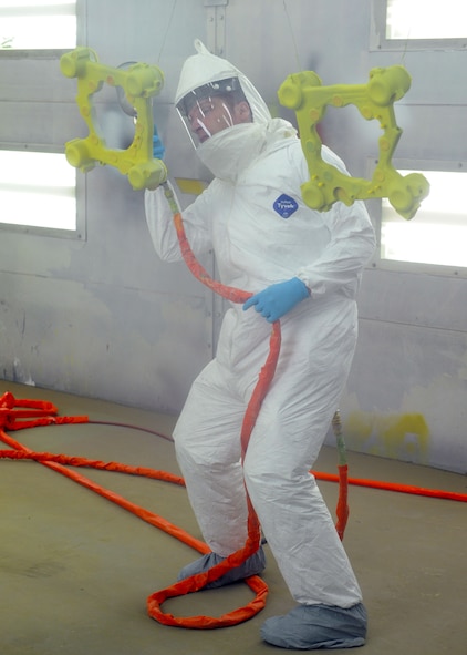 Senior Airman John Brzozowski, 7th Equipment Maintenance Squadron, paints a B-1 break assistant housing unit Oct. 18, 2011 at Dyess Air Force Base, Texas. The 7 EMS provides aircraft equipment maintenance assuring mission readiness for B-1s and C-130s. (U.S. Air Force photo by Airman 1st Class Jonathan Stefanko/ Released)