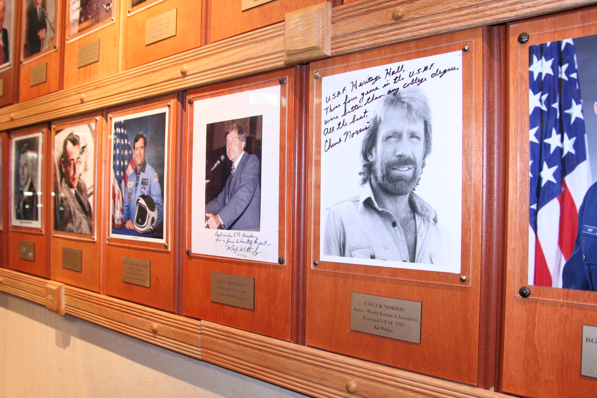 Faces on the Wall of Achievers represent those who rose from the enlisted ranks to greater fame, including actors and astronauts. (Air Force photo/Kelly Deichert)