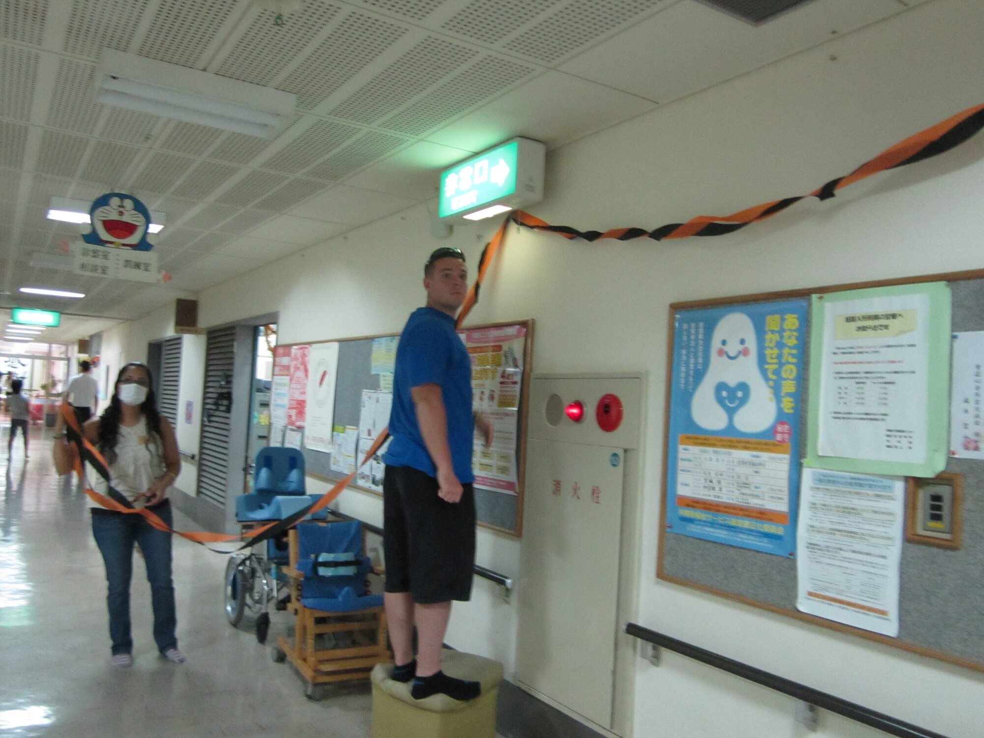 Students from Kadena Air Base NCO Academy Class 11-7 Falcon Flight, decorate the Okinawa Children’s Development Center in Okinawa City, Japan, Oct. 15. Many base units volunteer at various off-base facilities including the children’s center, single mothers’ homes and other community facilities. (U.S. Air Force photo/Keiko Toma/released) 