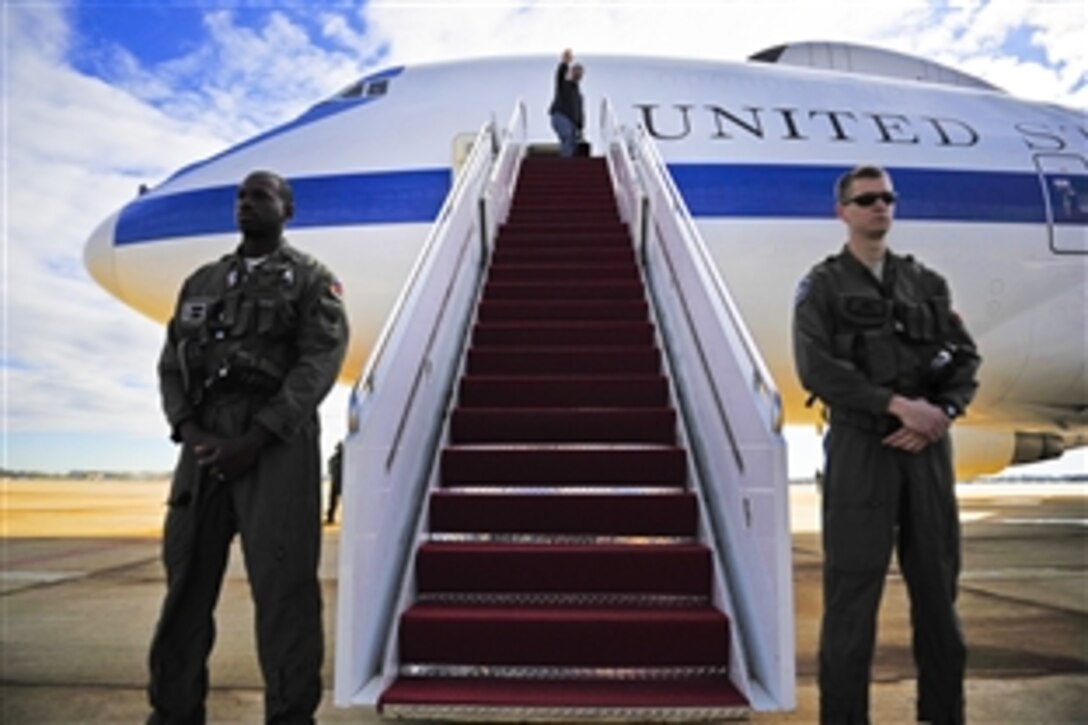 Defense Secretary Leon E. Panetta boards a U.S. Air Force E-4B National Airborne Operations Center aircraft at Joint Base Andrews, Md., before departing to visit defense leaders and U.S. troops in the Asia-Pacific region, Oct. 21, 2011. Panetta is scheduled to travel to Indonesia, Japan and South Korea on his first visit to Asia as defense secretary. 