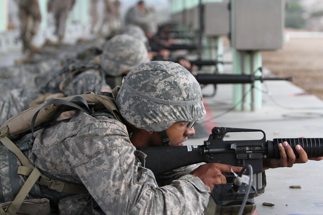 Andre Smith, a San Diego State University Army Reserve Officer Training Corps cadet and a Newport News, Va., native, fires rounds down range on the Carlos Hathcock Range aboard Marine Corps Air Station Miramar, Calif., Oct. 21. Cadets used the East Miramar training facilities for weapons and tactics familiarization.
