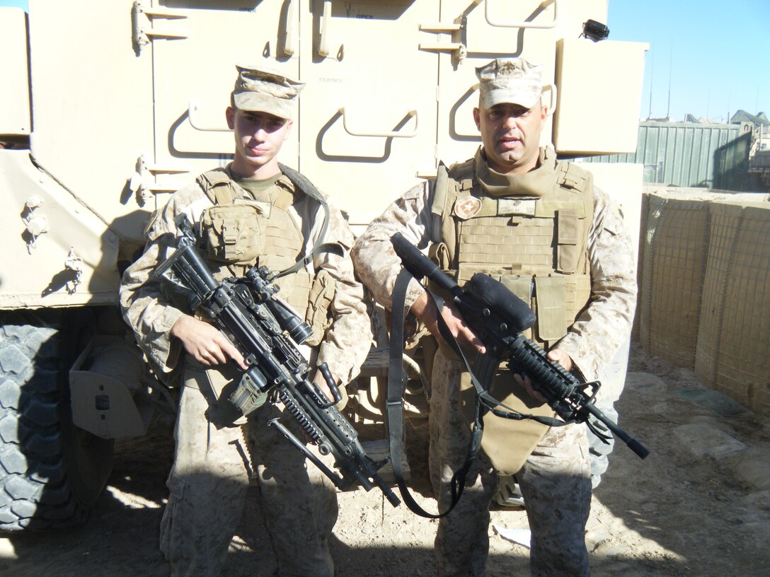 Gunnery Sgt. Brian LaPointe, right, a native of El Paso, Texas, serves as the motor transportation company first sergeant for Marine Wing Support Squadron 371 at Camp Leatherneck, Afghanistan. LaPointe’s son, Lance Cpl. Hugh Cuturia, is also deployed to Afghanistan as an infantryman with 3rd Battalion, 6th Marine Regiment.