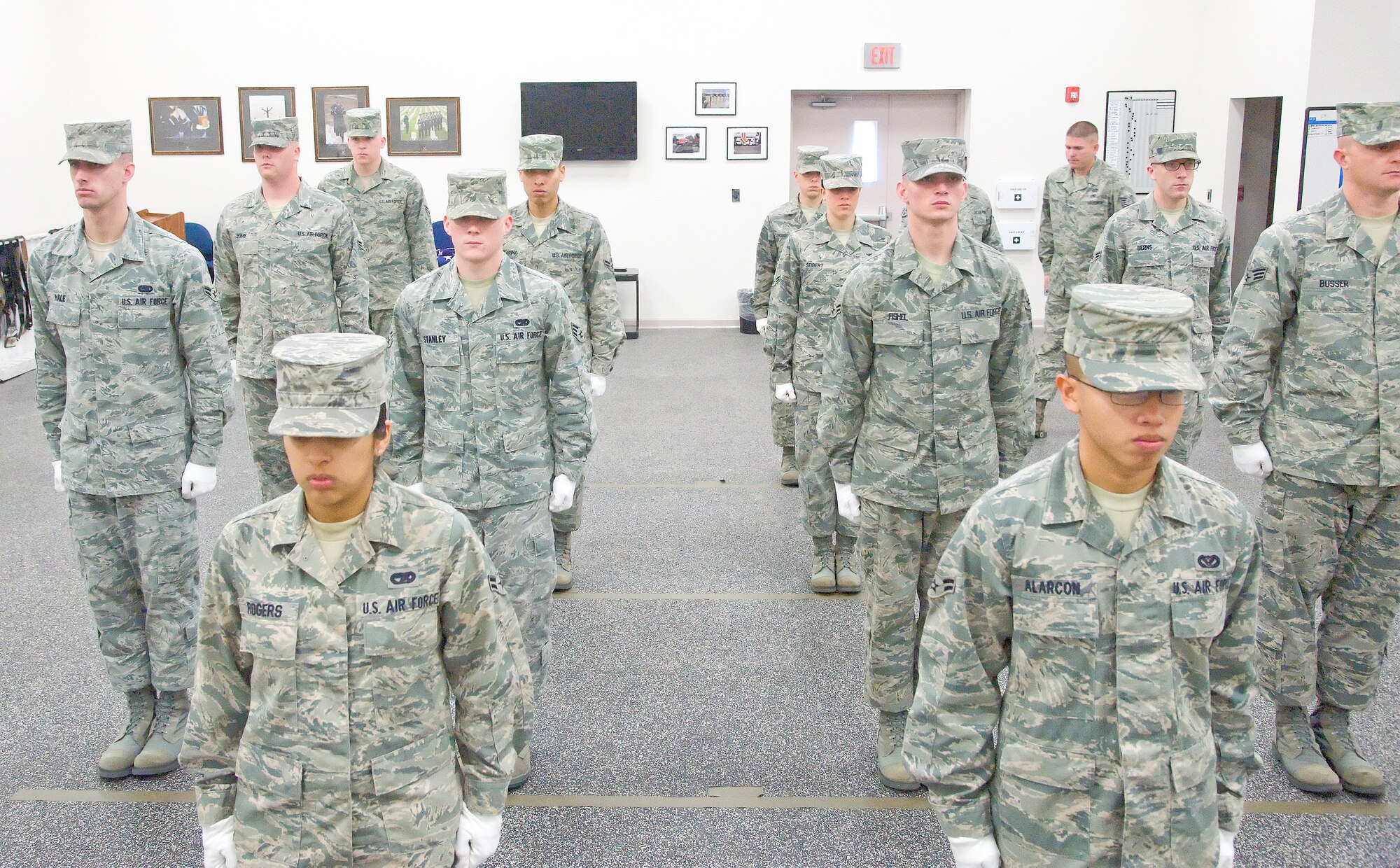 Ceremonial guardsmen stand in formation Oct. 20, 2011, at the Honor Guard facility at Dover Air Force Base, Del. Honor Guard members learn almost all the necessary skills to conduct drill and ceremony while in Training Flight. (U.S. Air Force photo by Adrian Rowan)  


