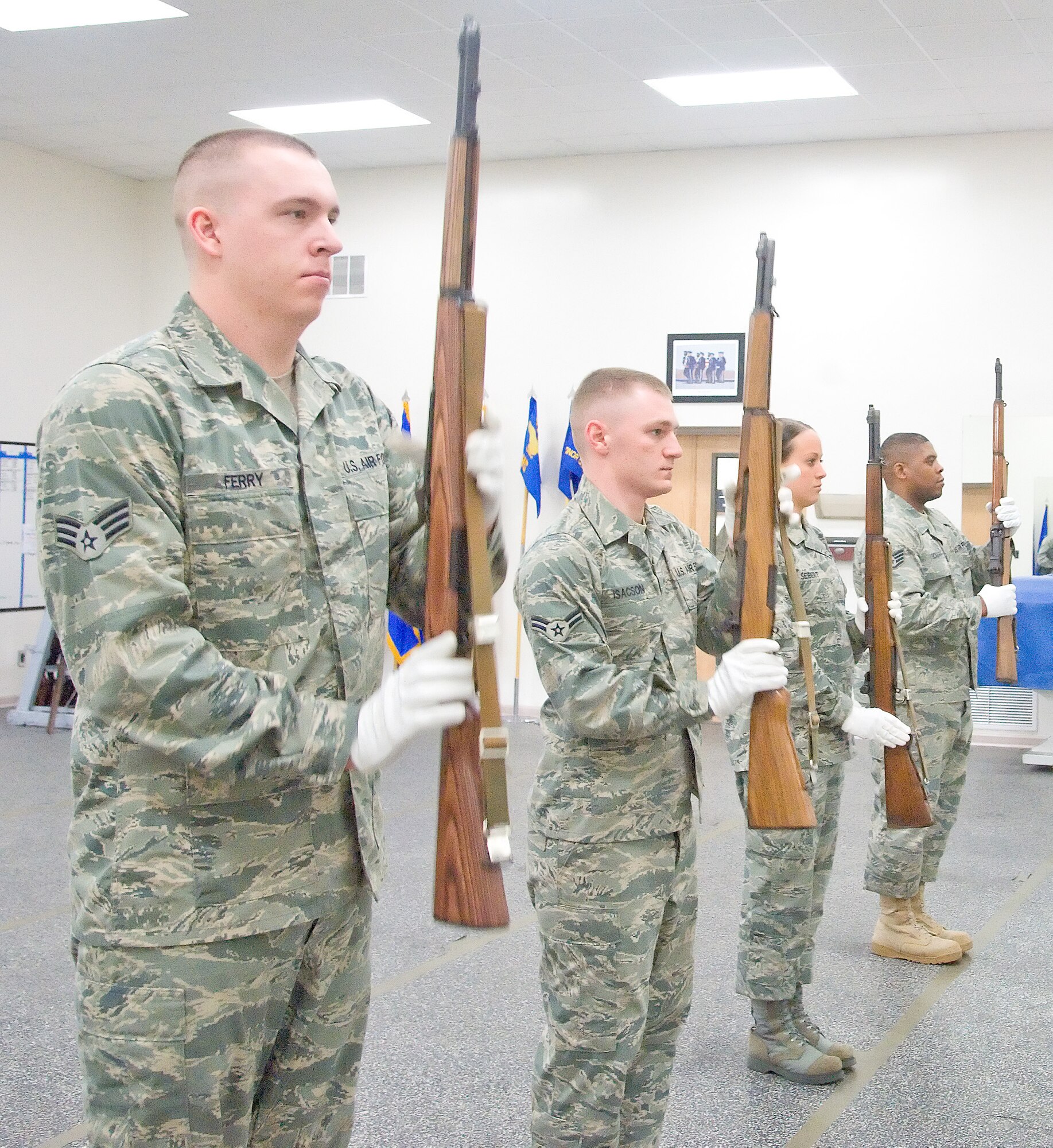 Ceremonial guardsmen practice drill movements Oct. 20, 2011, at the Honor Guard facility at Dover Air Force Base, Del. Honor Guard members learn almost all the necessary skills to conduct drill and ceremony while in Training Flight. (U.S. Air Force photo by Adrian Rowan)  

