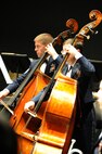 Senior Master Sgt. Chris Kosky and Tech. Mathew Murray, U.S. Air Force Band double bass players, perform Oct. 21 at the Tassel Performing Arts Certer, Holdrege, Neb. The USAF Band is on it's 2011 Fall Tour in Midwestern U.S. traveling through Montana, Wyoming, Nebraska and South Dakota. (U.S. Air Force photo by Airman 1st Class Tabitha N. Haynes)