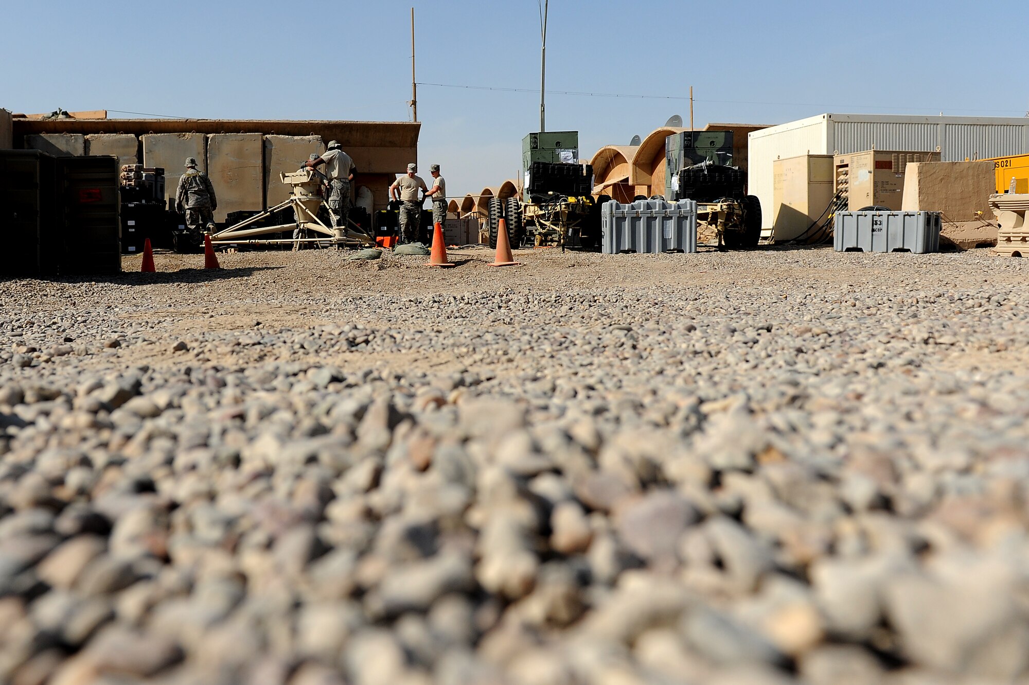 Airmen from the 5th Combat Communications Group, Robins Air Force Base, Ga., assemble a tactical satellite communications called a ground multiband terminal, or GMT, at Sather Air Base, Iraq, Oct. 7, 2011. The tactical communications network is being set up for Airmen on the ground as the U.S. military continues preparation for the scheduled withdrawal. (U.S. Air Force photo/Staff Sgt. Mike Meares)