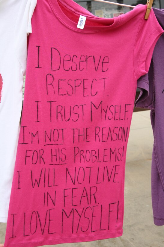 Shirts with statistics about domestic violence were displayed at the Marine Corps Recruit Depot San Diego Exchange Mall Oct. 22 as Marine Coprs Community Services hosted Make a Difference Day 2011 Walk and Wellness Expo. The day consisted of a mile-and-a-half walk around the depot and educational booths and services to raise awareness of breast cancer and domestic violence.