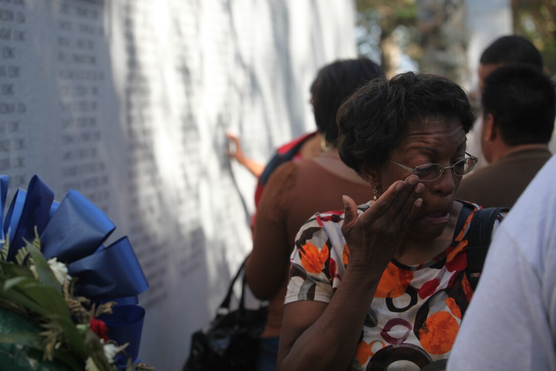 A Beirut Memorial Observance Ceremony attendee mourns the lives lost during the Beirut bombings at the Marine barracks in Beirut on Oct. 23, 1983. The bombings killed 241 Marines, sailors and soldiers.