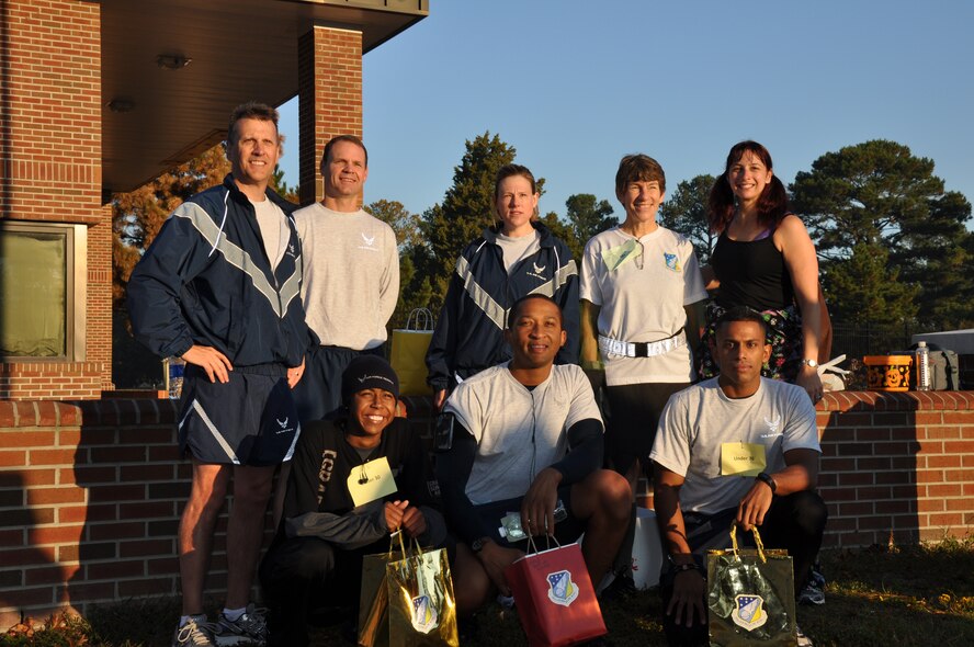 Col. Randy Ogden, Lt. Col. Doug Miller, and Senior Airman Zeddie Cormartie all won the semi-annual Warrior Run for their age categories. Col. Caroline Evernham, Lt. Col. Ann Brown and Maj. Nicole Hurley won for their age categories. SSgt. Msael Hidalgo and training flight member Sha'kera Rodriguez were the fastest male/female overall. (USAF photo by MSgt. Wendy Lopedote, 916ARW/PA)