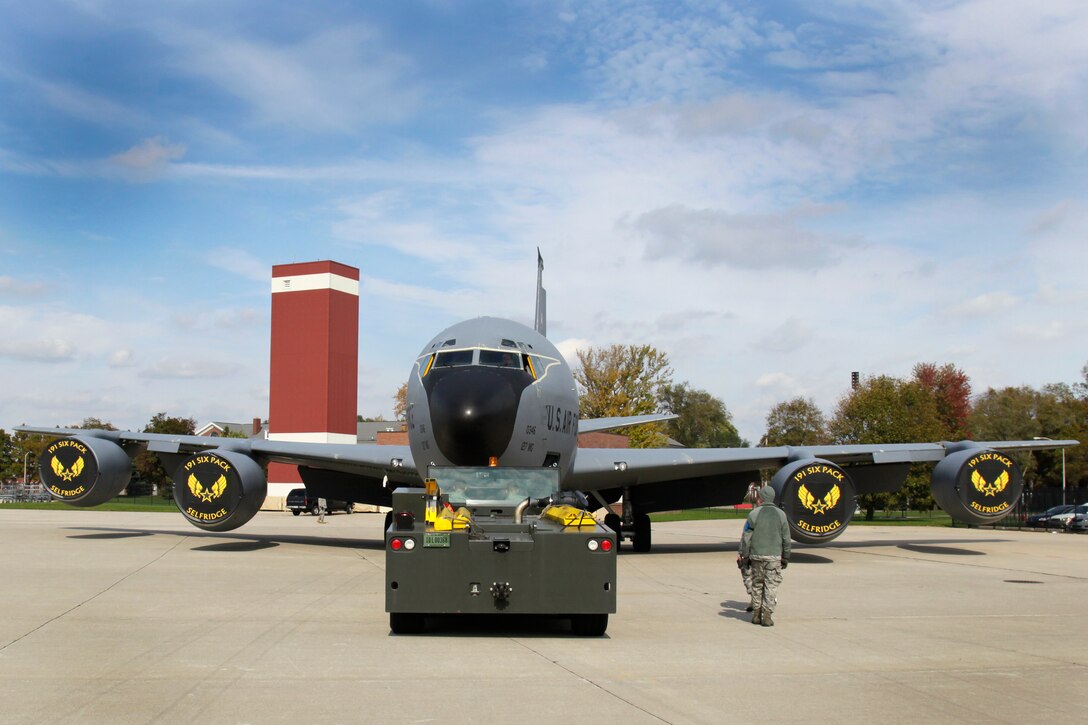 A tug tows a KC-135 Stratotanker to a maintenance hangar at Selfridge Air National Guard Base, Mich., Oct. 22, 2011. The aircraft was being moved to prepare it for a routine, scheduled maintenance operation. (U.S. Air Force photo by MSgt. Terry Atwell)