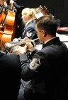 Master Sgt. Christian Pagnard, U.S. Air Force Band trumpeter, performs Oct. 21 at the Tassel Performing Arts Certer, Holdrege, Neb. The USAF Band is on a 25-day community relations tour traveling through Montana, Wyoming, Nebraska and South Dakota. (U.S. Air Force photo by Airman 1st Class Tabitha N. Haynes)