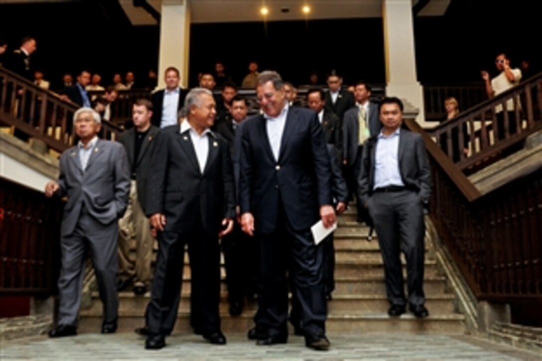 U.S. Defense Secretary Leon E. Panetta walks with Indonesian Defense Minister Purnomo Yusgiantoro after meeting with defense ministers of the Association of Southeast Asian Nations in Bali, Indonesia, Oct. 23, 2011.