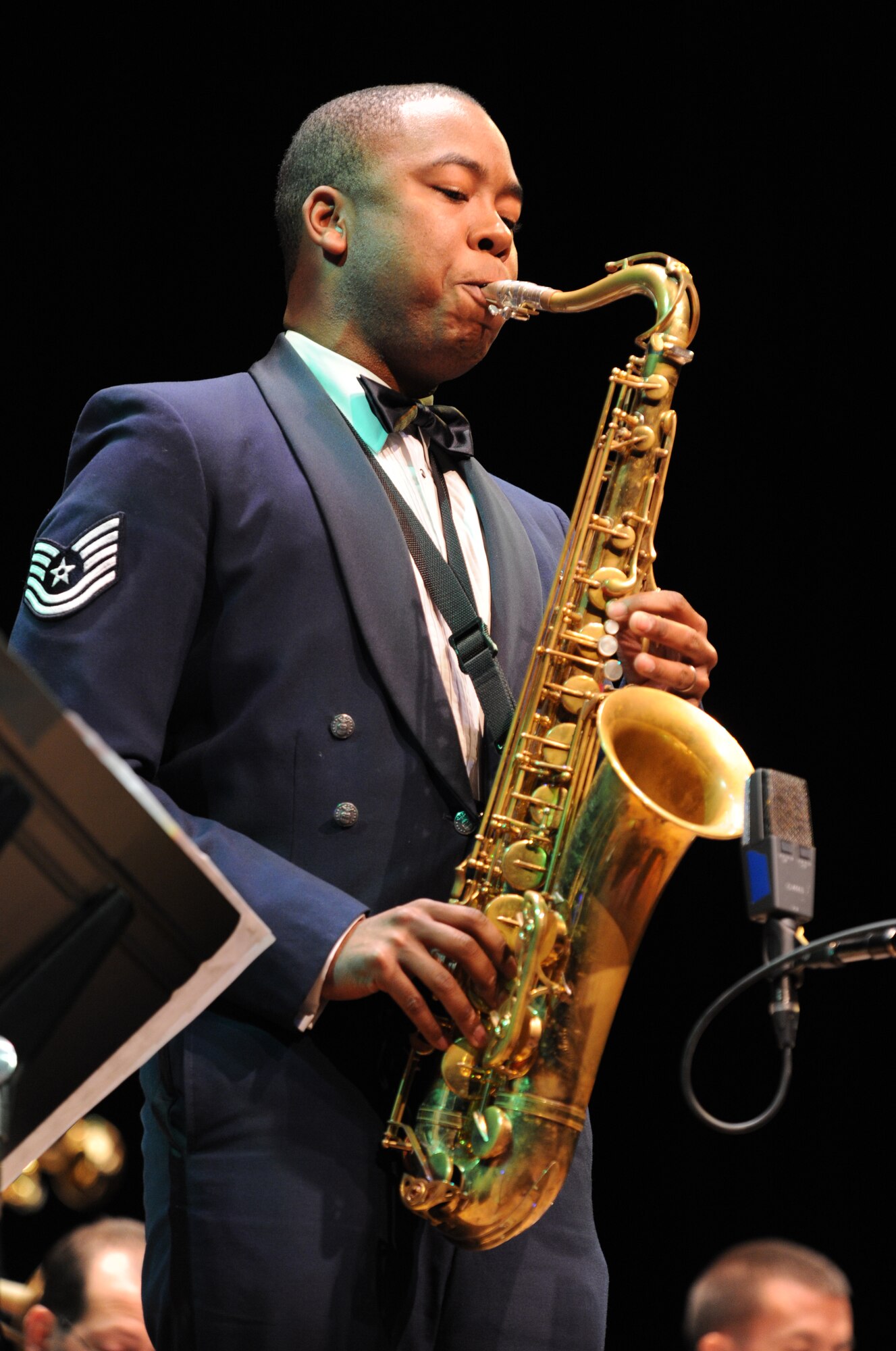 Tech. Sgt. Grant Langford solos on tenor saxophone during the 2011 Jazz Heritage Series concert featuring vocal sensation Carmen Bradford (photo courtesy of Rob Mesite Photography)