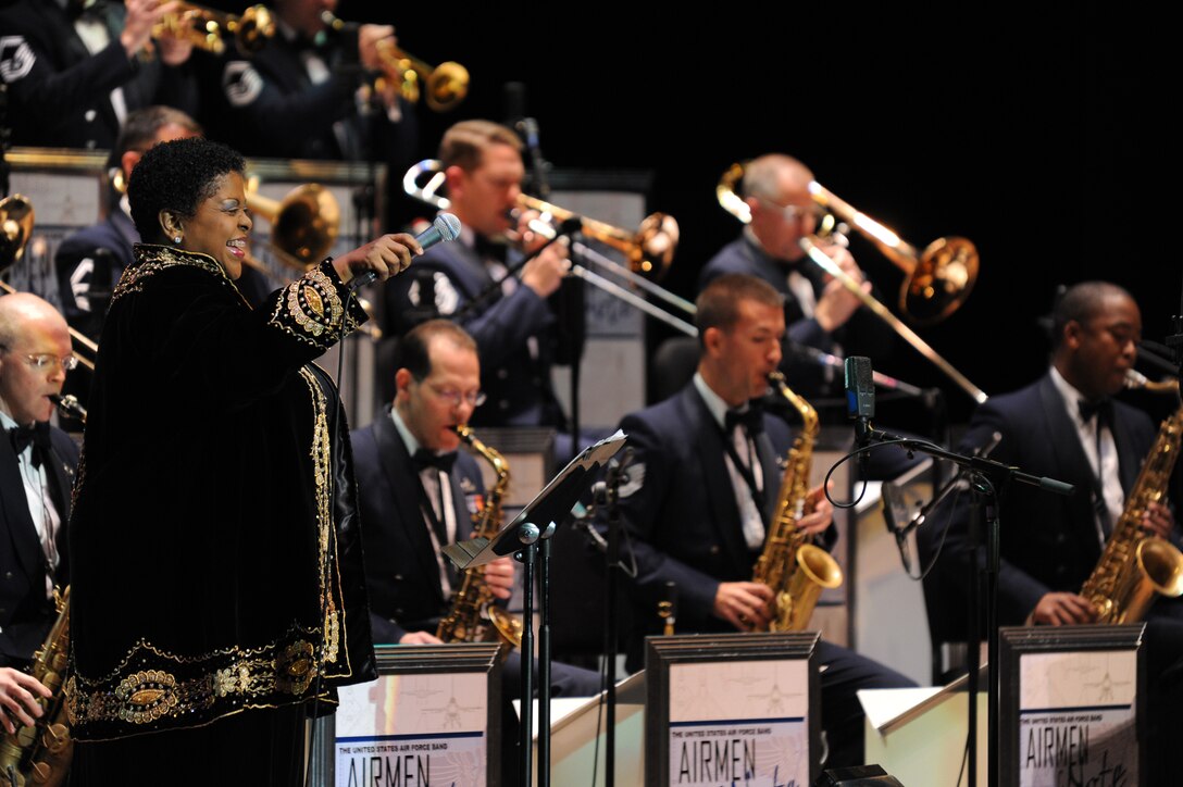 Carmen Bradford is all smiles during her exceptional performance with the USAF Band Airmen of Note during the first concert of the 2011 Jazz Heritage Series (photo courtesy of Rob Mesite Photography)