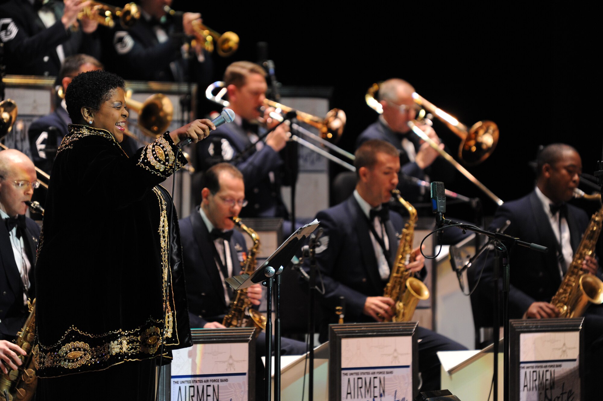 Carmen Bradford is all smiles during her exceptional performance with the USAF Band Airmen of Note during the first concert of the 2011 Jazz Heritage Series (photo courtesy of Rob Mesite Photography)