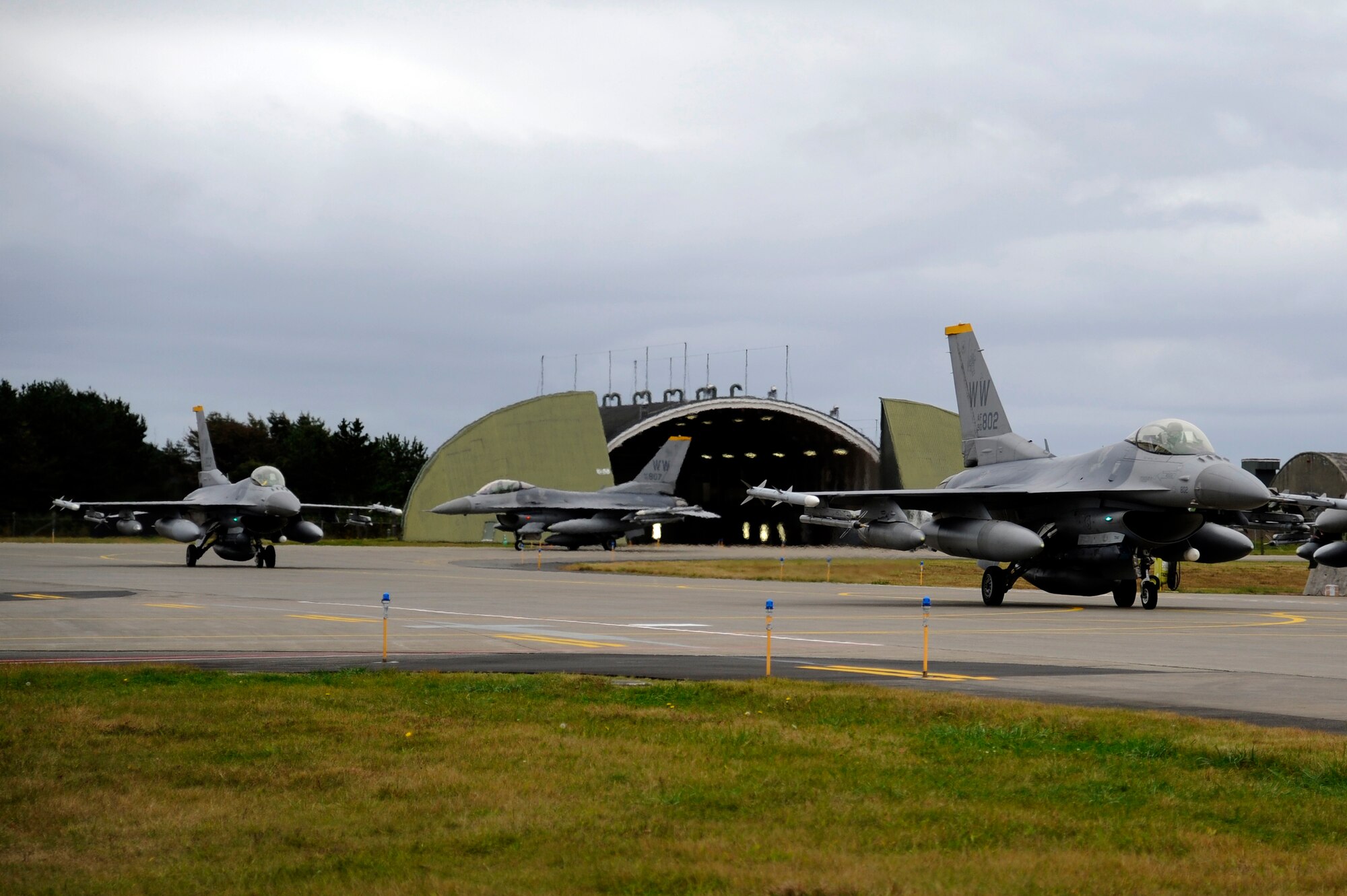 MISAWA AIR BASE, Japan - Members of the 13th Fighter Squadron taxi on Misawa's runway here Oct. 24. Several F-16 Fighting Falcons, with the 13 FS, returned home after an approximate one month long stay at Eielson Air Force Base, Alaska, in support of Operation Noble Eagle, Red Flag-Alaska and Distant Frontier exercise. (U.S. Air Force photo/Tech. Sgt. Marie Brown)