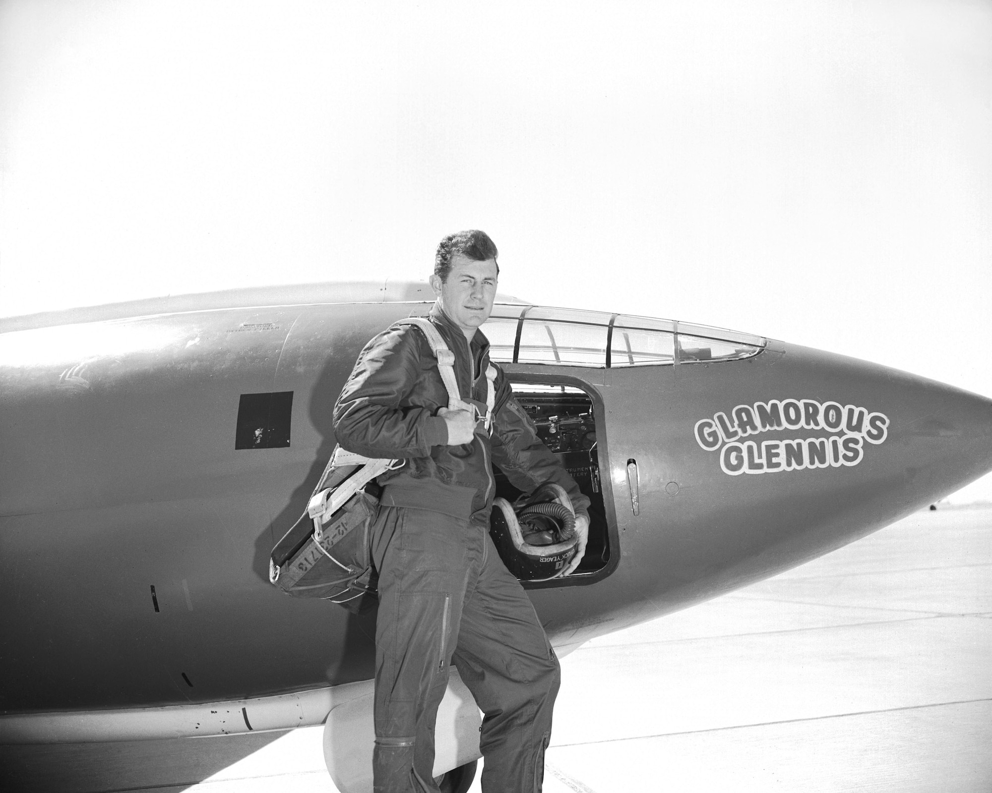 Air Force Captain Charles E. “Chuck” Yeager and the rocket-powered Bell X 1, which he dubbed the “Glamorous Glennis.” On October 14, 1947, Captain Yeager piloted the X-1 to Mach 1.06 (approximately 700 mph at 42,000 feet), becoming the first man to break the so-called "sound barrier."  (U.S. Air Force Photo courtesy AFFTC History Office) 