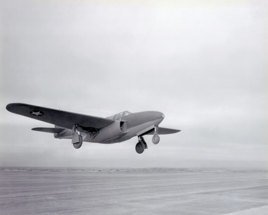 The XP-59A, America’s first turbojet-powered airplane.  On October 1, 1942, as Bell test pilot Bob Stanley completed the final series of high-speed taxi tests, the aircraft's wheels lifted off from the surface of Rogers Dry Lake and, for the first time, an American turbojet became airborne. The official first flight took place October 2. (U.S. AIr Force Photo courtesy AFFTC History Office) 