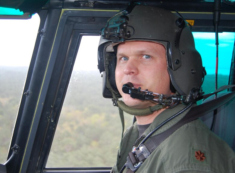 CAZAUX AIR BASE, France -- Maj. Scott Adams, 0167th Pyrenees helicopter pilot, sits in the cockpit of the EC-725 Caracal at Cazaux Air Base, France. Major Adams is part of an exchange pilot program and is the first American combat search and rescue pilot to be assigned to the French Air Force. The goal of the exchange pilot program is to allow countries to share knowledge and tactics. (Courtesy Photo) 